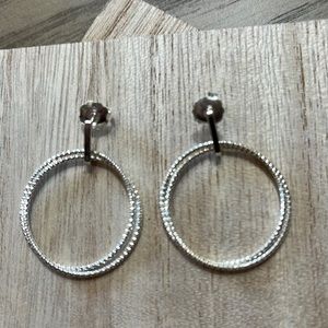 9.25 Sterling silver earrings an eye stopper for sure. Dress up or down precious